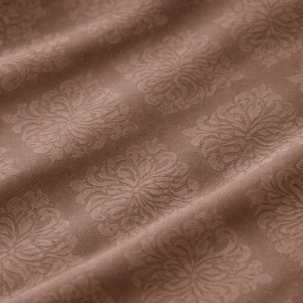 Close-up of brown fabric with floral pattern