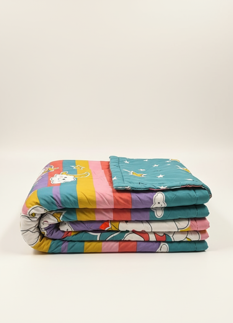 Stack of colorful quilted blankets on a white background